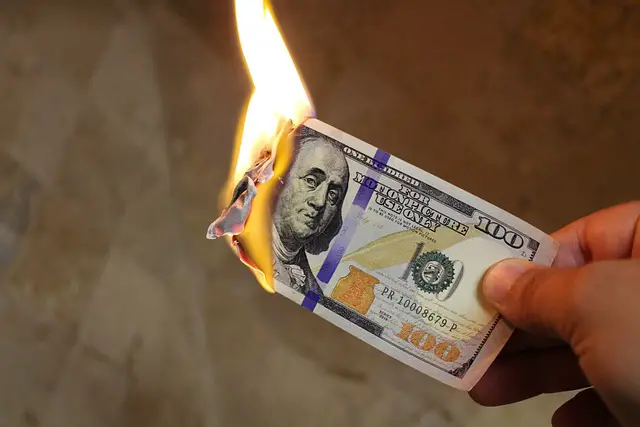 Is it Illegal to Burn Money in the U.S.? Know the Law and Penalties